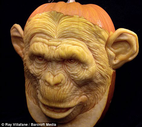 An ape face carved out of a pumpkin by Ray Villafane and team 