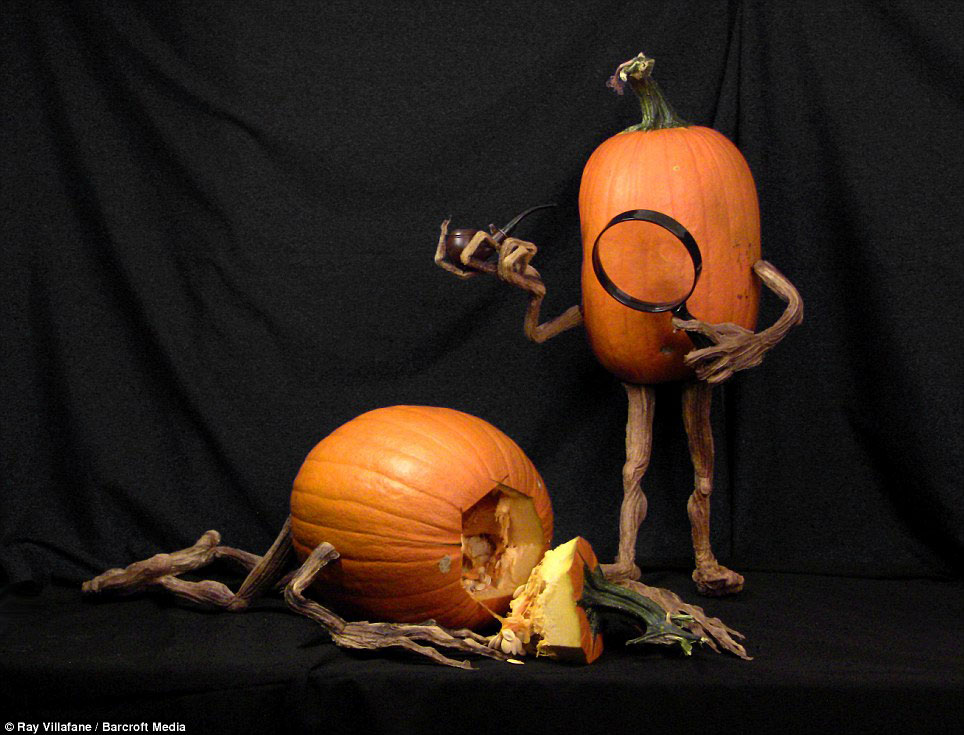 Characters: A pumpkin inspects a 'crime scene' with his magnifying glass in this creation by Ray Villafane